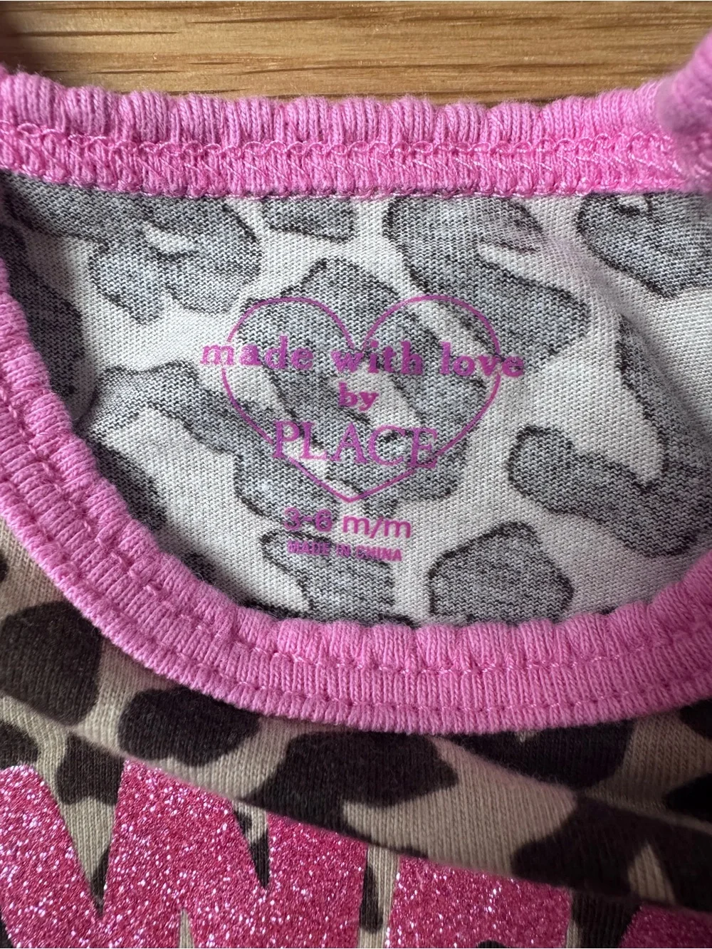 The Children's Place Leopard Print Bodysuit with Pink Trim and Glitter 